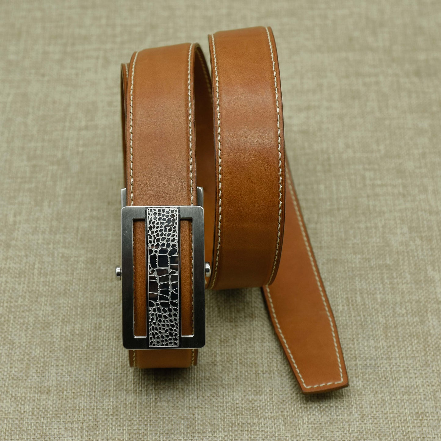 Handcrafted vachetta leather belts